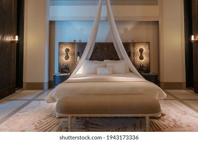 Luxurious interior of a very expensive rich water villa in the Maldives, decorated with natural wood. - Shutterstock ID 1943173336
