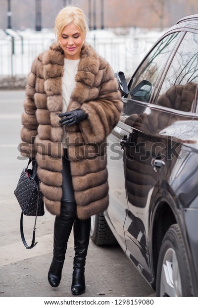 woman in fur coat