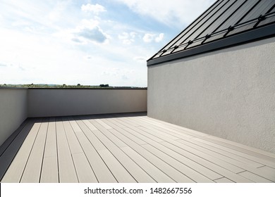 Luxurious Modern House In A Developer Standard. Composite Deck Terrace And Graphite Sheet Metal Roof.