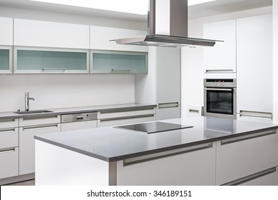 Luxurious modern kitchen with stainless steel appliances, Modern minimalist kitchen with dishwasher baking oven and hood