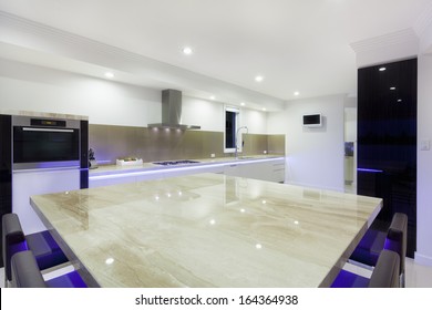 Luxurious New Kitchen With LED Lights And Modern Appliances