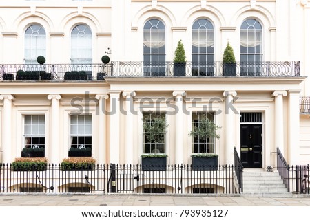 Luxurious old apartament house with a white facade, , Kensington, London, UK