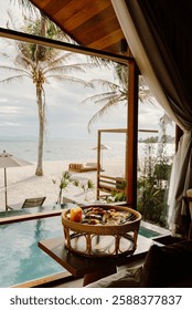 Luxurious poolside breakfast setup at a beachfront villa in Koh Lipe, Thailand. Featuring a private pool, tropical surroundings, and elegant dining, perfect for a serene and indulgent getaway