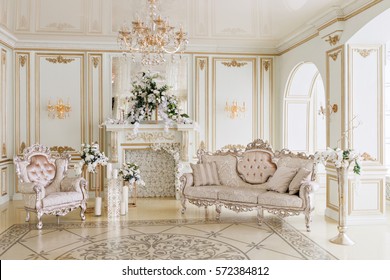 Luxurious vintage interior with fireplace in the aristocratic style