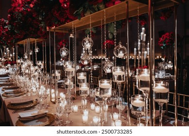 Luxurious wedding interior wedding table with floral centerpieces, candles, and a backdrop of twinkling lights Banquet decoration in hall restaurant. Festive tables with flower composition on black ta - Powered by Shutterstock