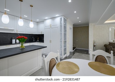 Luxurious White Modern Domestic Kitchen With Black Marble Worktop