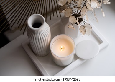 Luxurious white tray decoration, home interior decor with burning candle - Shutterstock ID 1938442693