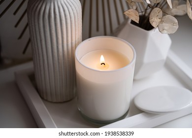 Luxurious white tray decoration, home interior decor with burning candle - Shutterstock ID 1938538339