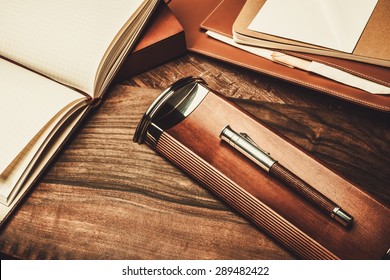 Luxurious Writing Tools On A Wooden Table 
