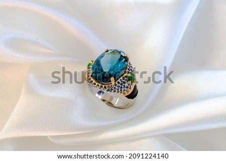 Luxuriously designed wedding ring made of aquamarine and gold