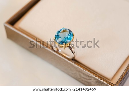Luxuriously designed wedding ring made of aquamarine and gold