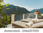 A luxury 5 star hotel facility, an outdoor private patio with Como lake view. An empty villa