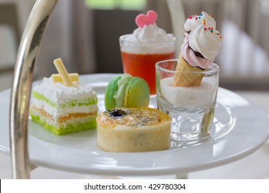 Luxury Afternoon Tea With Dessert On Wooden Table.