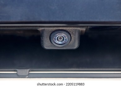 Luxury Back Car Rear View Camera Close Up For Parking Assistance In Macro. Concept Of Safety Car Driving While Parking Process. Assist Device Equipment In Modern Cars