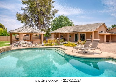 A Luxury backyard with a pool  - Shutterstock ID 2139112527