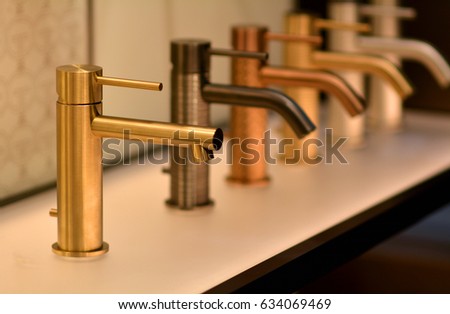 Luxury bathroom. Gold faucet. Golden faucet. Faucet isolated. Sink faucet. Bathroom faucets. Gold tap