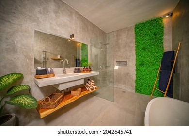 Luxury Bathroom With Polished Concrete On The Walls And PVC On The Floor. Modern Bathroom With Cement Polish Walls.