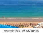 Luxury beach hotel on the seashore. Beach holidays on the coast of Fujairah, UAE