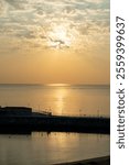 Luxury beach hotel on the seashore at sunset. Beach holidays on the coast of Fujairah, UAE, Mirage Bab Al Bahr