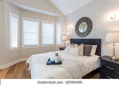  Luxury Bedroom. Contemporary Design With Reclaimed Wood Bedside Tables And Lamp. Nice And Cozy Accommodations. Hotel Or Resort Room.