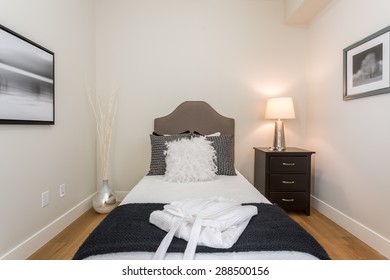 Luxury Bedroom. Contemporary Design With Reclaimed Wood Bedside Tables And Lamp.Nice And Cozy Accommodations. Hotel Or Resort Room.