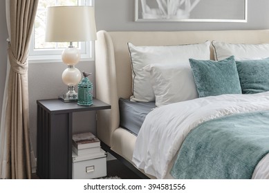 Luxury Bedroom With Green Color Tone And Classic Lamp On Table Side