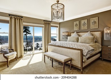 Luxury bedroom interior with rich furniture and scenic view from walkout deck