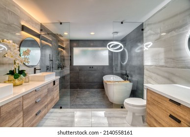 A luxury black and white bathroom 