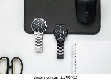 Luxury blacks and silver watch on white Table. Business man accessories - Powered by Shutterstock