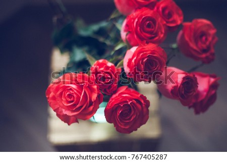 Luxury bouquet made of red roses in flower shop Valentines Bouquet of red roses. Close-up.