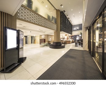 Luxury Boutique Hotel Lobby, With Pending Light Marble Stone, Hotel Employee In Seoul, South Korea. 