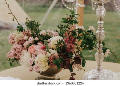 Luxury Burgundy And Pink Flowers Centerpiece. Elegant Wedding Event Decor In Marquee, Outdoor.