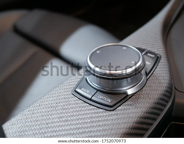 luxury\
button control panel in a modern car,car\
interior.
