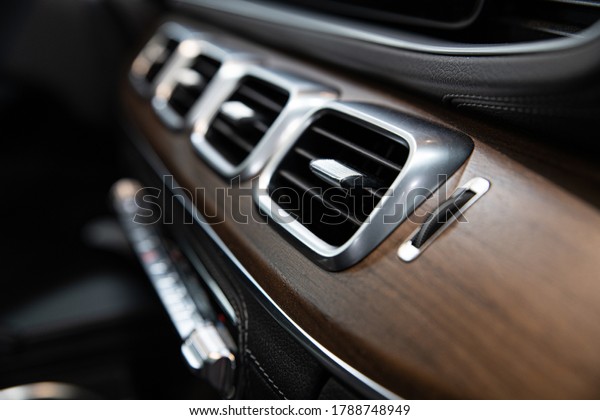 Luxury car\
air vents and air conditioning. Modern\
car