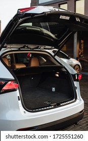 Luxury car boot with folded seats. Opened empty car trunk. Clean trunk of the SUV.