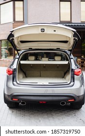Luxury car boot with folded seats. Opened empty car trunk. Clean trunk of the SUV.