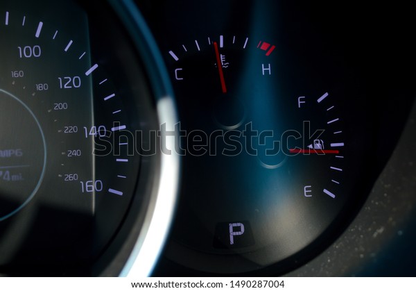 luxury\
car control cluster, tachometer, and\
speedometer.