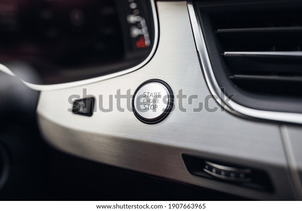 Luxury car engine start\
and stop button