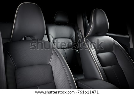 Luxury car inside. Interior of prestige modern car. Comfortable leather seats. Black perforarated leather cockpit. Foto stock © 