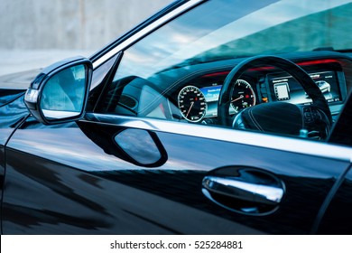 Luxury Car Interior Details. Dashboard And Steering Wheel