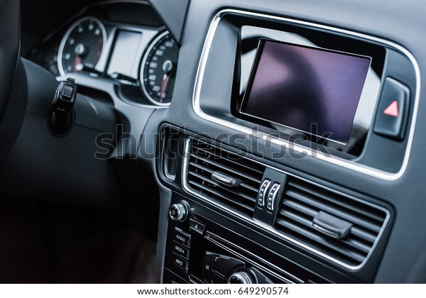 Luxury car
interior. Interior of prestige modern car. Dashboard and steering
wheel. Car interior
details.
