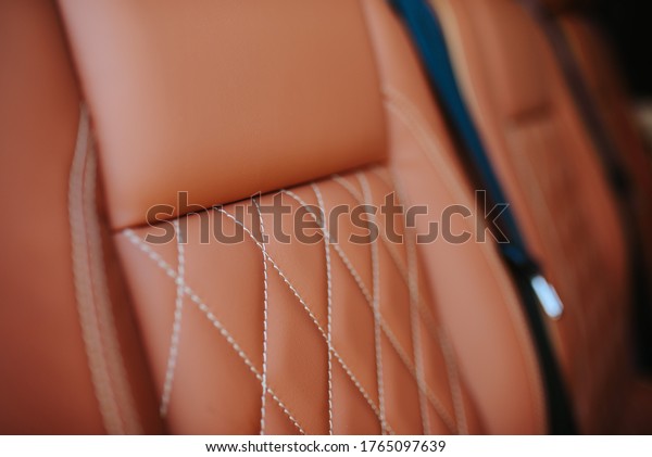 Luxury car interior. Car
interior luxury service.
Leather interior of a minibus. Beige
leather interior
