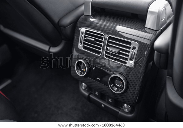 Luxury car\
rear seat row air conditioning\
control