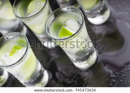 Luxury cocktail with tequila and lime closeup