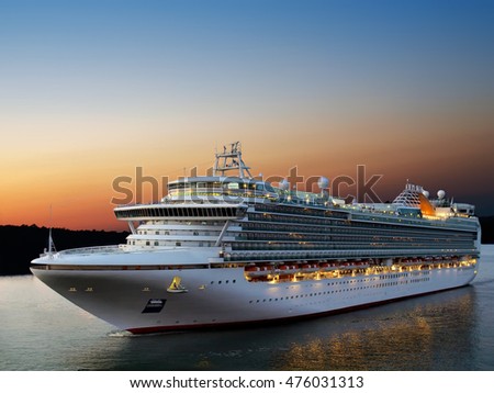 Luxury cruise ship sailing to port on sunrise 