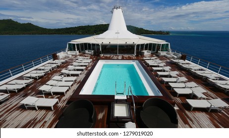 A luxury cruise ship at sea near the South Pacific islands of French Polynesia, traversing from Papeete on Tahiti to Bora Bora, Moorea, Taha'a and Huahine (Society Islands). 
