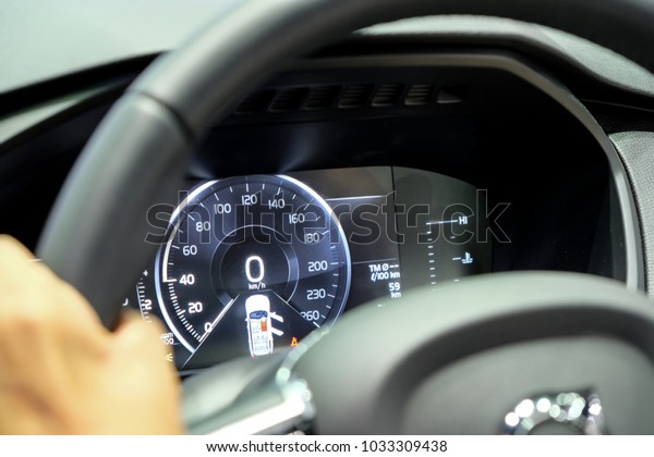 Luxury\
Digital Car Dashboard with Steering as\
Foreground