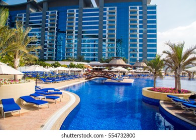 Luxury District View In Dubai With An Infinity Pool Just In Front Of The Sea.