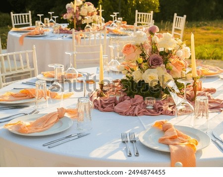 Luxury elegant wedding reception table arrangement and floral centerpiece - wedding banquet and event outdoor