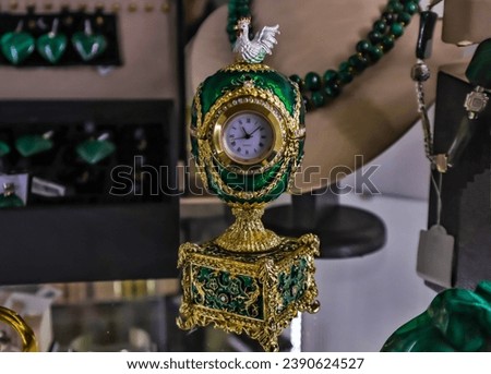 Luxury Faberge egg with clock, antique gold jewelry